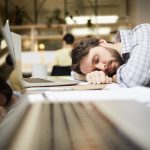 Busy professional asleep as he needs to get fit and healthy